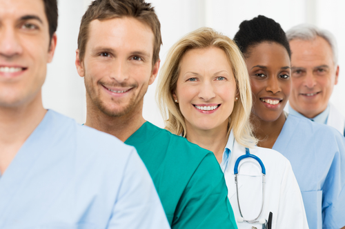 Group Of Happy Doctors Group Of Happy Successful Doctors Standing In A Row At Hospital